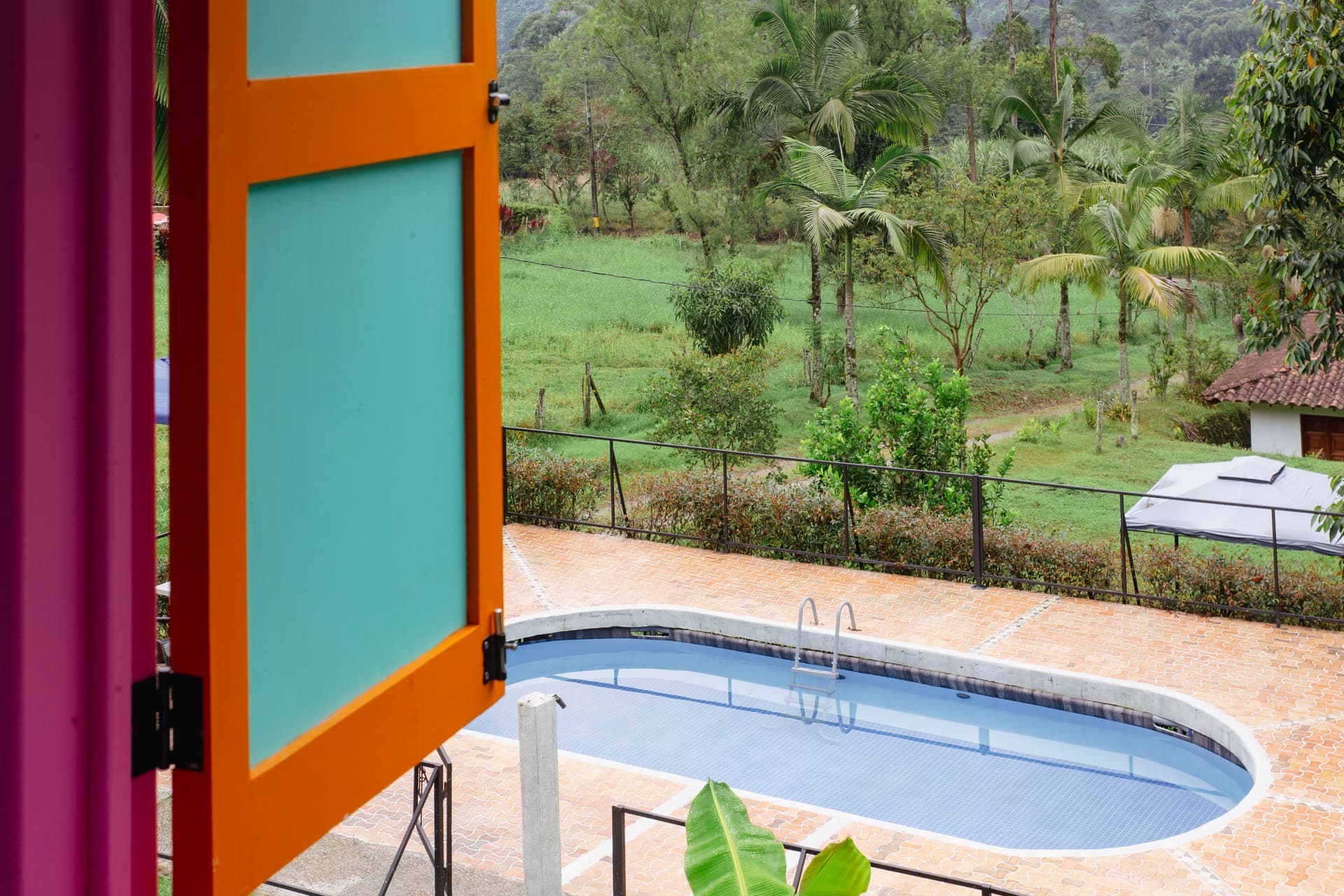 Pool with mountain views at Isla de Pascua Hostel